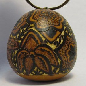 Carved floral gourd, (dried squash) signed Bertha Medina from the Andes of Peru.